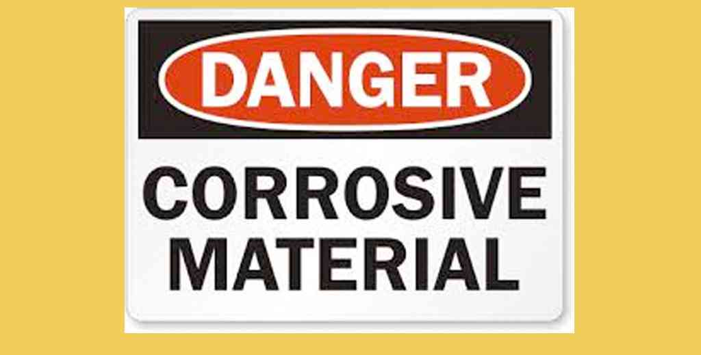 danger corrosive material sign